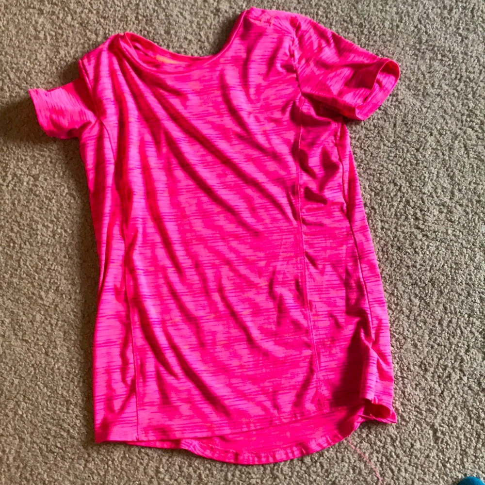 a girls pink excercise shirt